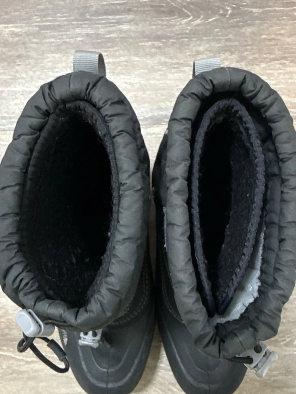 The North Face Kids Black Insulated Snow Boots with Bungee Closure